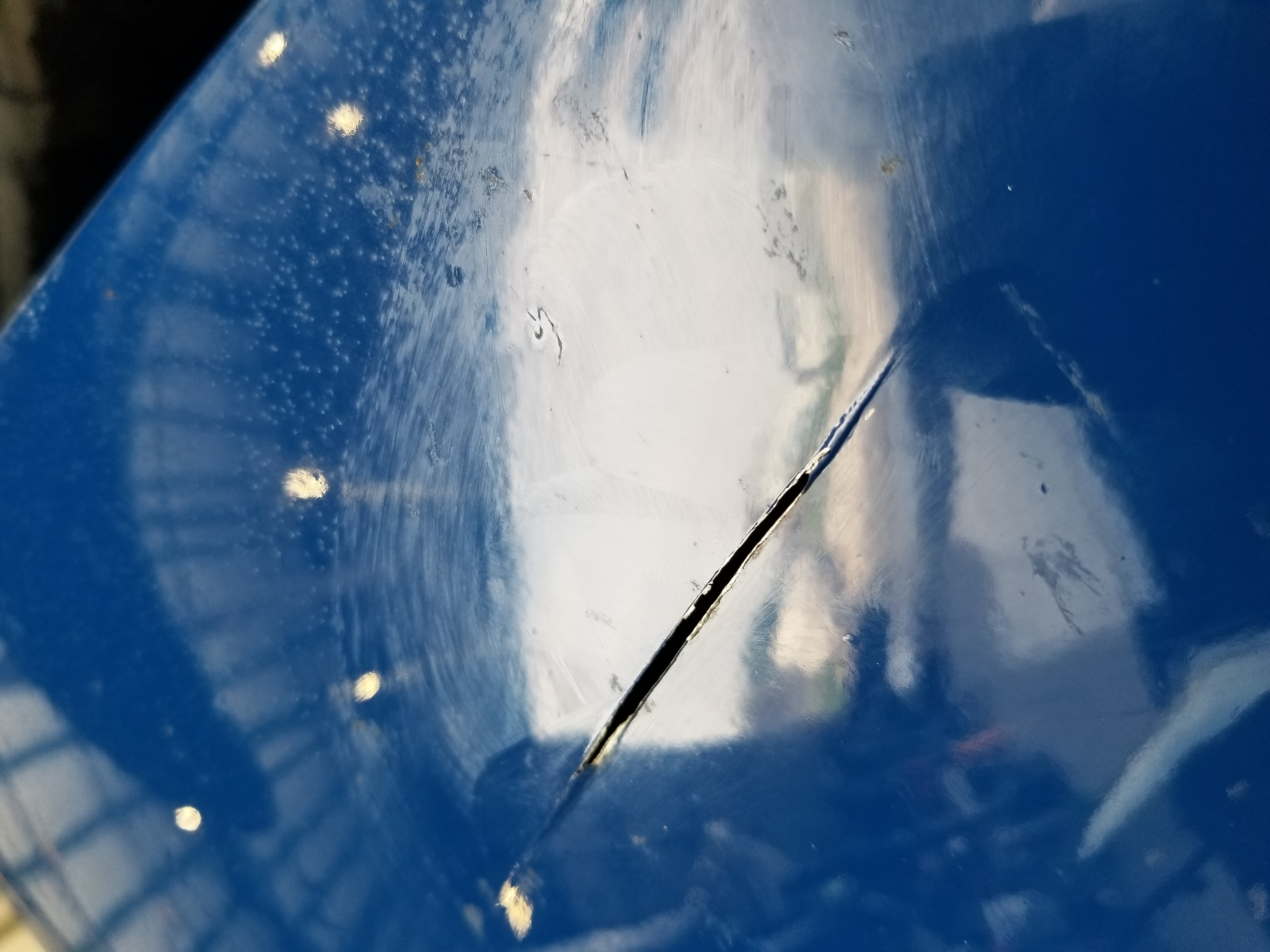 Grumman cowling damage before repair